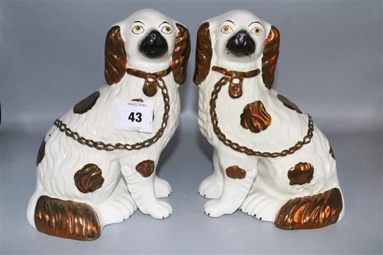 Pair Staffordshire copper lustre spaniels